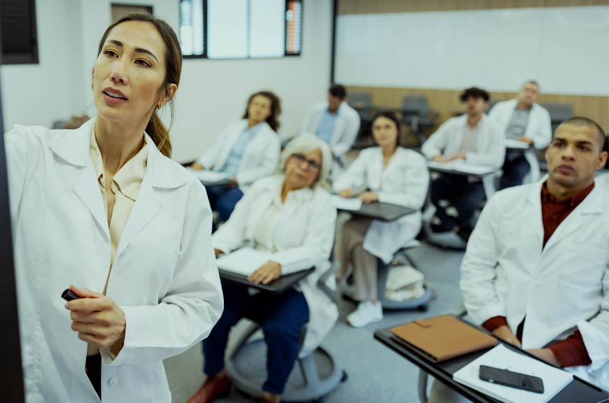 Photo of a doctor giving a seminar to other doctors